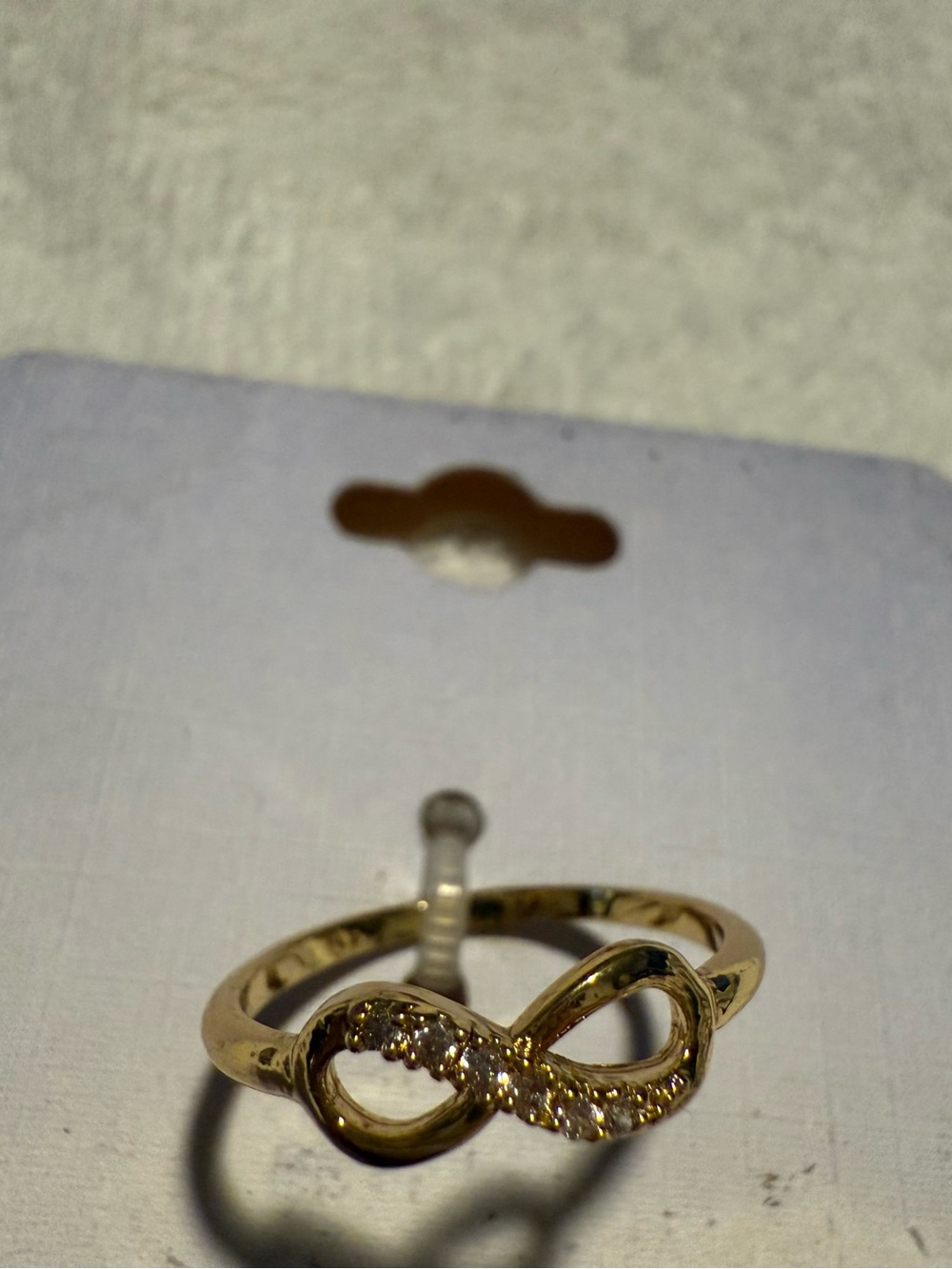 Delicate Gold Tone Infinity Ring with Sparkling Accents